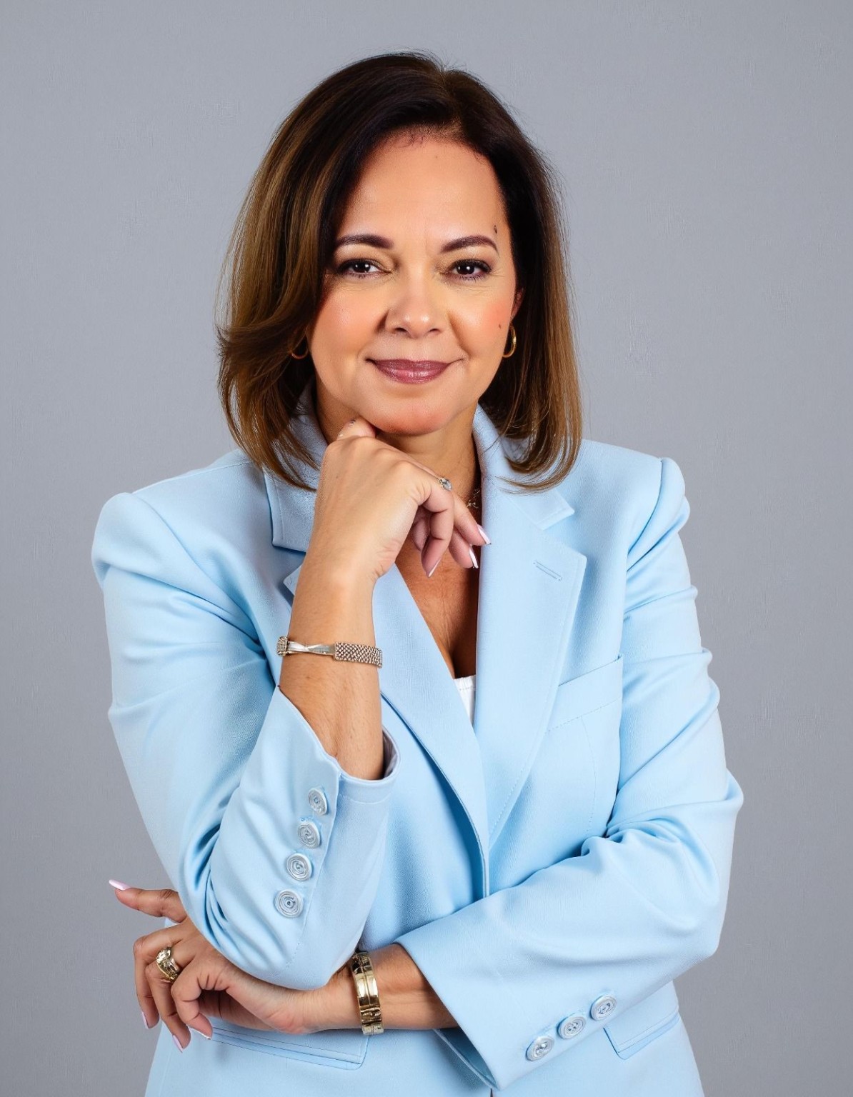 Iliana Arana, bookkeeping and accounting professional, in a light blue blazer